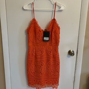 Bright orange strappy plunge lace dress